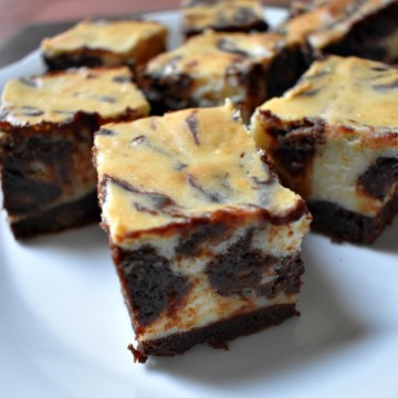Cheesecake Brownies are extra rich and decadent! The perfect blend of cream cheese and chocolate. No one will guess they're gluten free!!