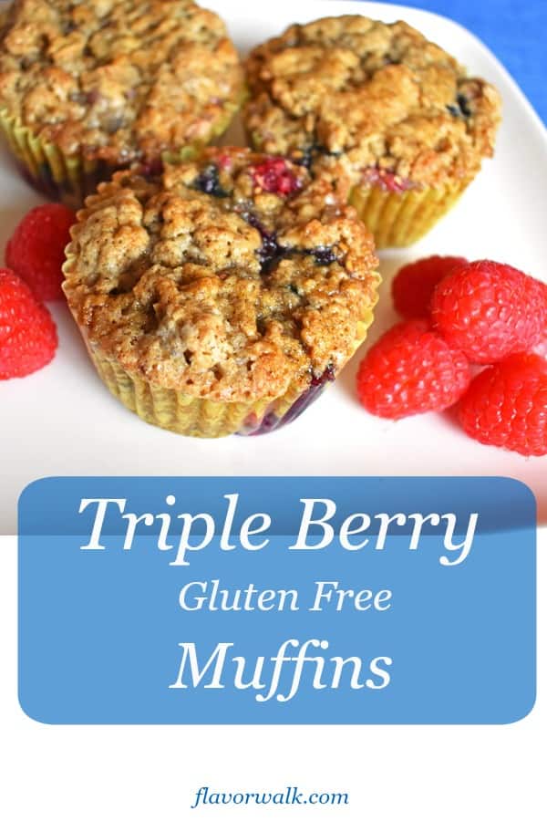 Triple Berry Gluten Free Muffins are bursting with fresh berries! They're extra moist in the middle, crunchy on the outside and perfect for both a breakfast treat or afternoon snack!
