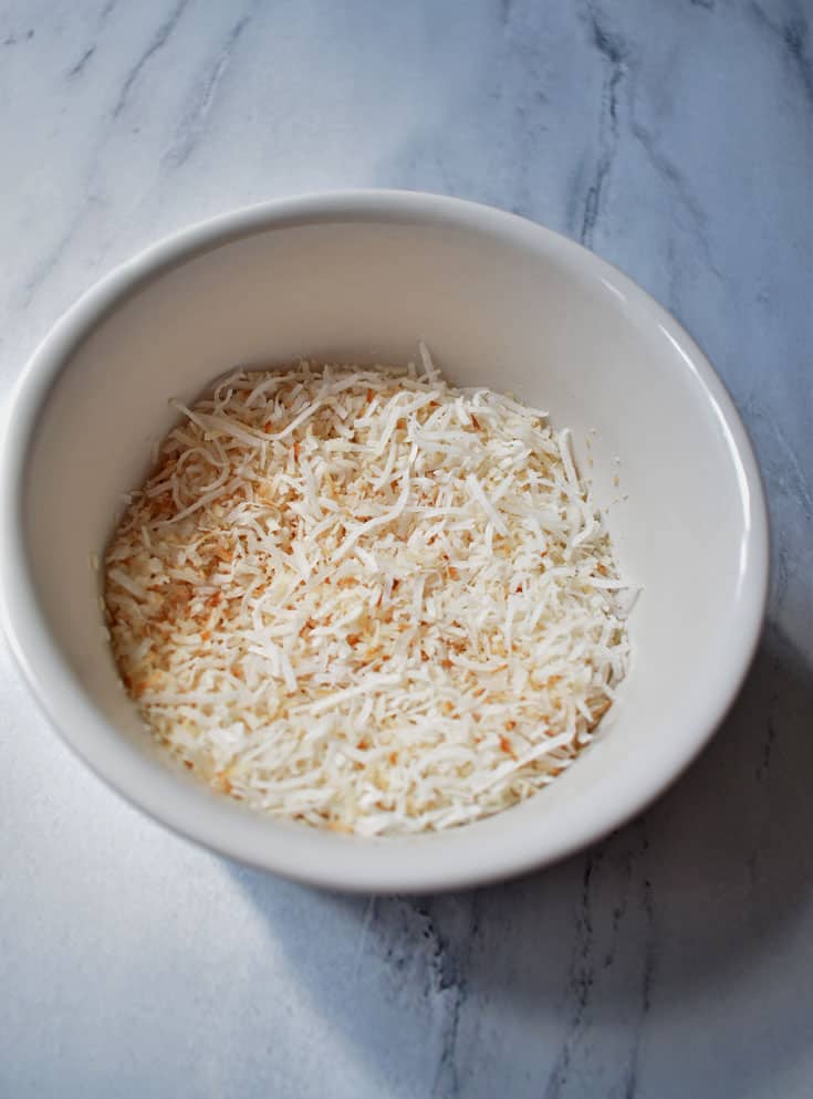 Toasted Coconut in a white bowl
