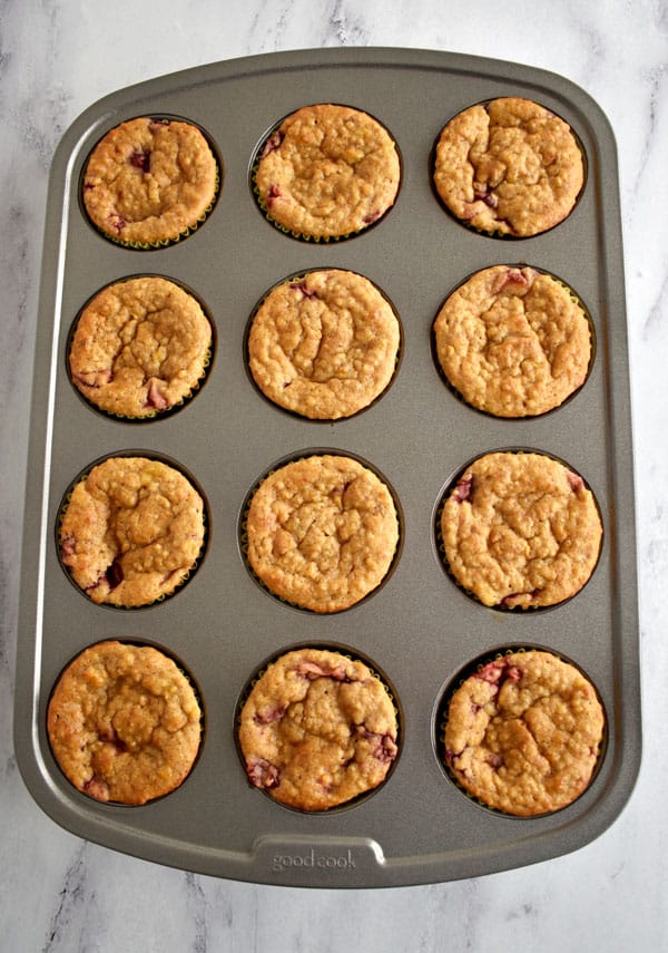 12 Healthy Quinoa Banana and Strawberry Muffins in muffin pan
