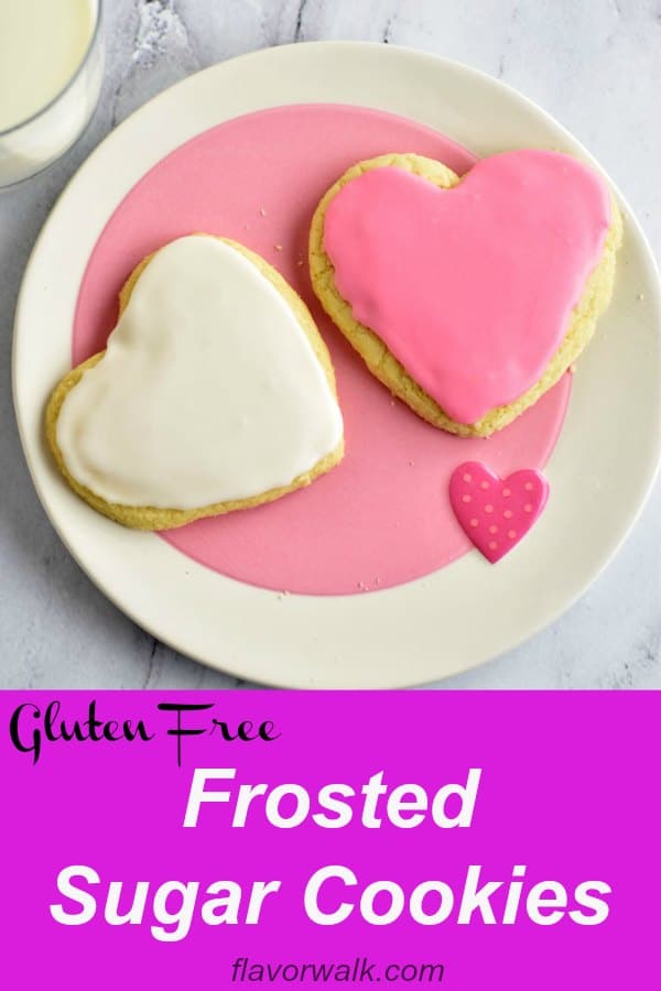 These frosted sugar cookies are soft on the inside and crisp around the edges. The almond flavored frosting makes them perfectly sweet and melt-in-your-mouth delicious. No one will guess they're gluten free! Recipe at www.flavorwalk.com #glutenfreecookies #frostedsugarcookies