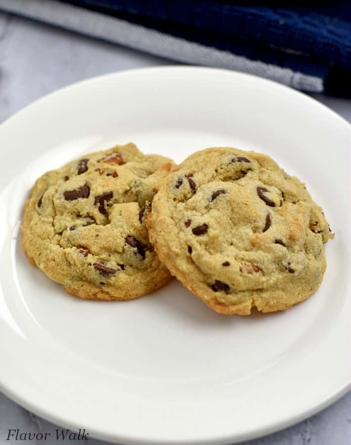 2 chocolate chip peanut butter cookies on small white plate