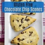 Overhead view of 4 baked Gluten Free Chocolate Chip Scones on a white rectangular plate with blue text overlay near the top