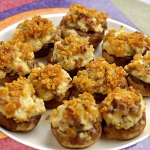A plate of gluten free stuffed mushrooms.