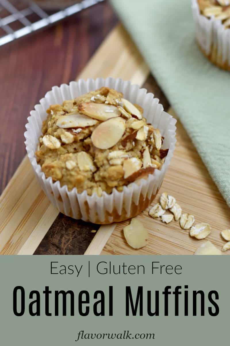 One gluten free oatmeal muffin on a wood cutting board with a green text overlay at the bottom.