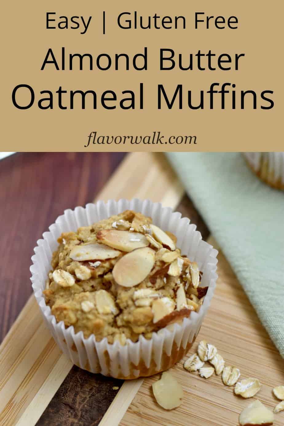 One gluten free oatmeal muffin on a wood cutting board with a tan text overlay at the top.