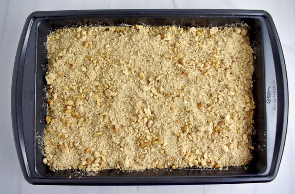 Overhead view of unbaked gluten free chocolate chip crumb cake in a 9 x 13-inch baking pan.