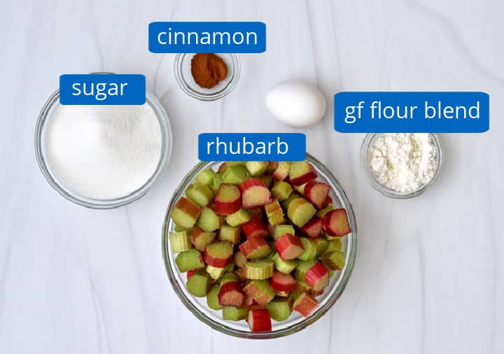 Overhead view of ingredients, with labels, for making the rhubarb filling for rhubarb crumble.
