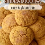 Close up view of a plateful of gluten free pumpkin snickerdoodles with white overlays near the top with orange, brown, and black text for Pinterest.