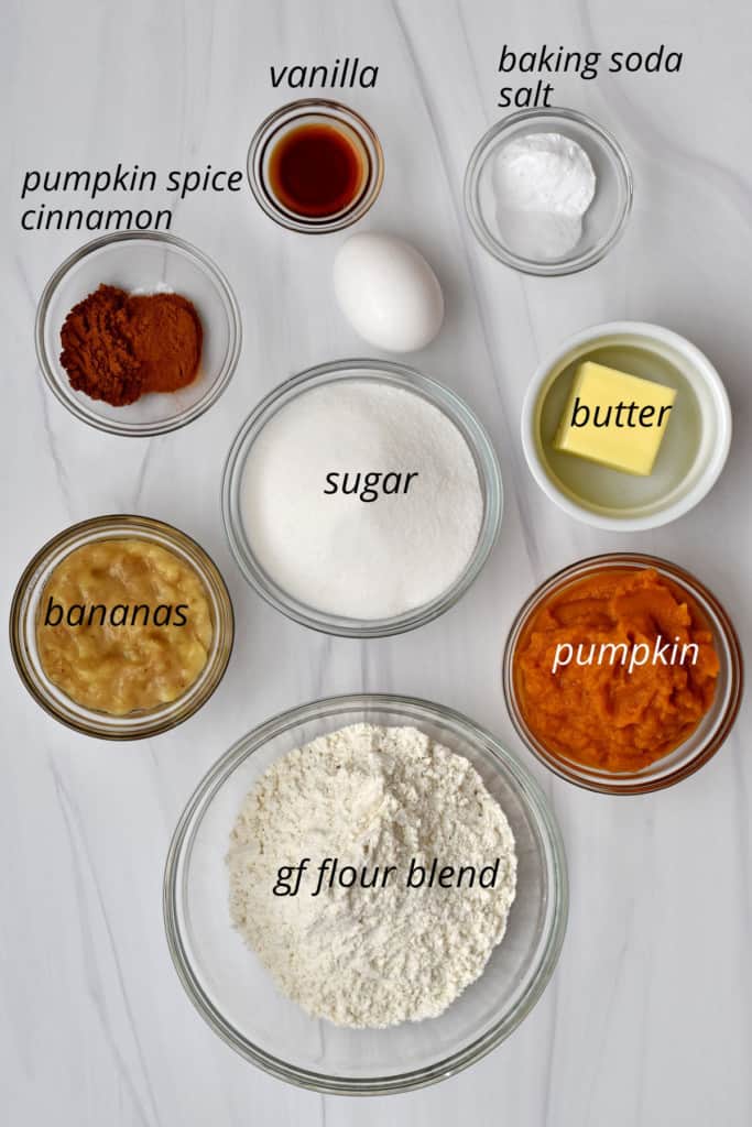 Overhead view of ingredients, with labels, for making gluten free pumpkin banana muffins.
