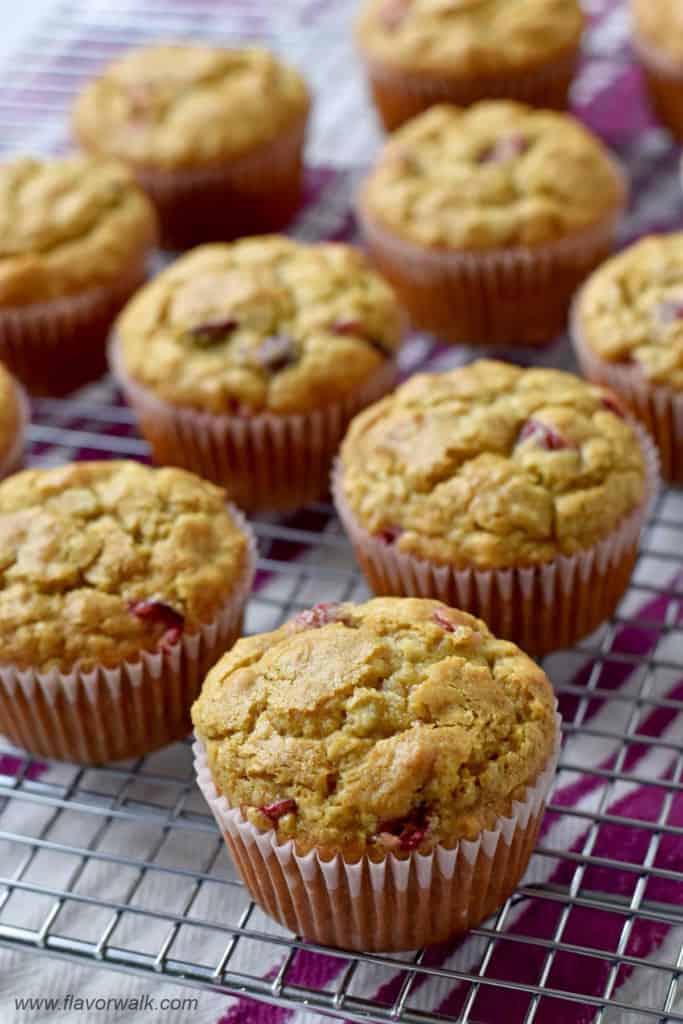 Close up view of gluten free cranberry muffins on a wire rack.