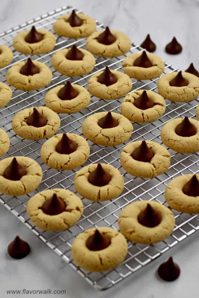 Gluten free peanut butter blossoms cooling on a wire rack.