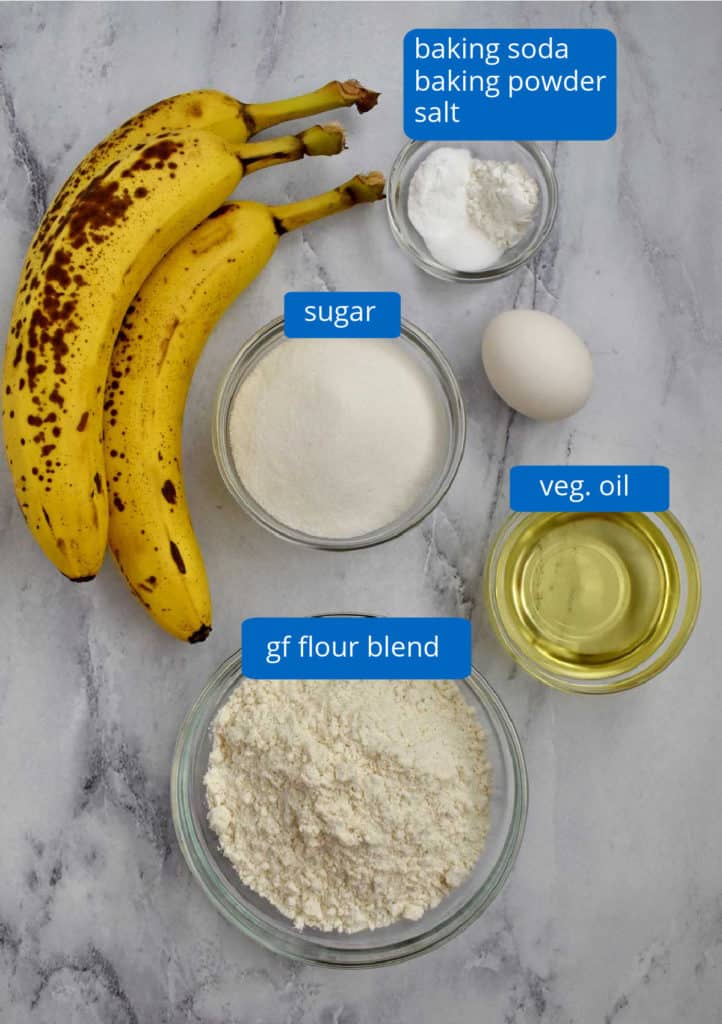 Ingredients, with labels, for making gluten free banana muffins.