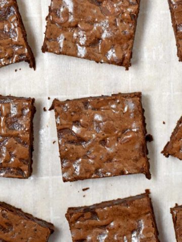 Cut brownies on parchment paper.