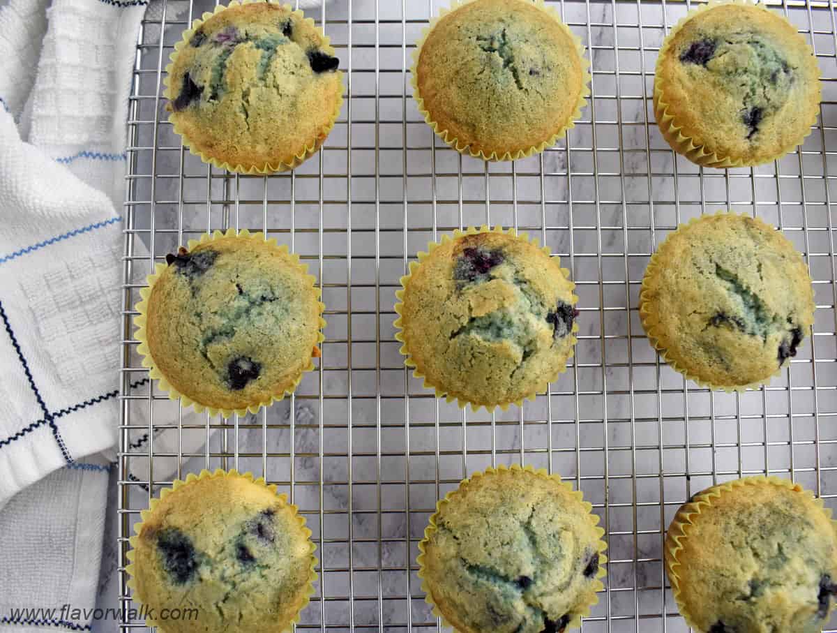 Gluten free blueberry muffins on wire rack.