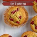 Gluten free strawberry muffins scattered on counter with text overlay, "Strawberry Muffins, Easy & Gluten Free."