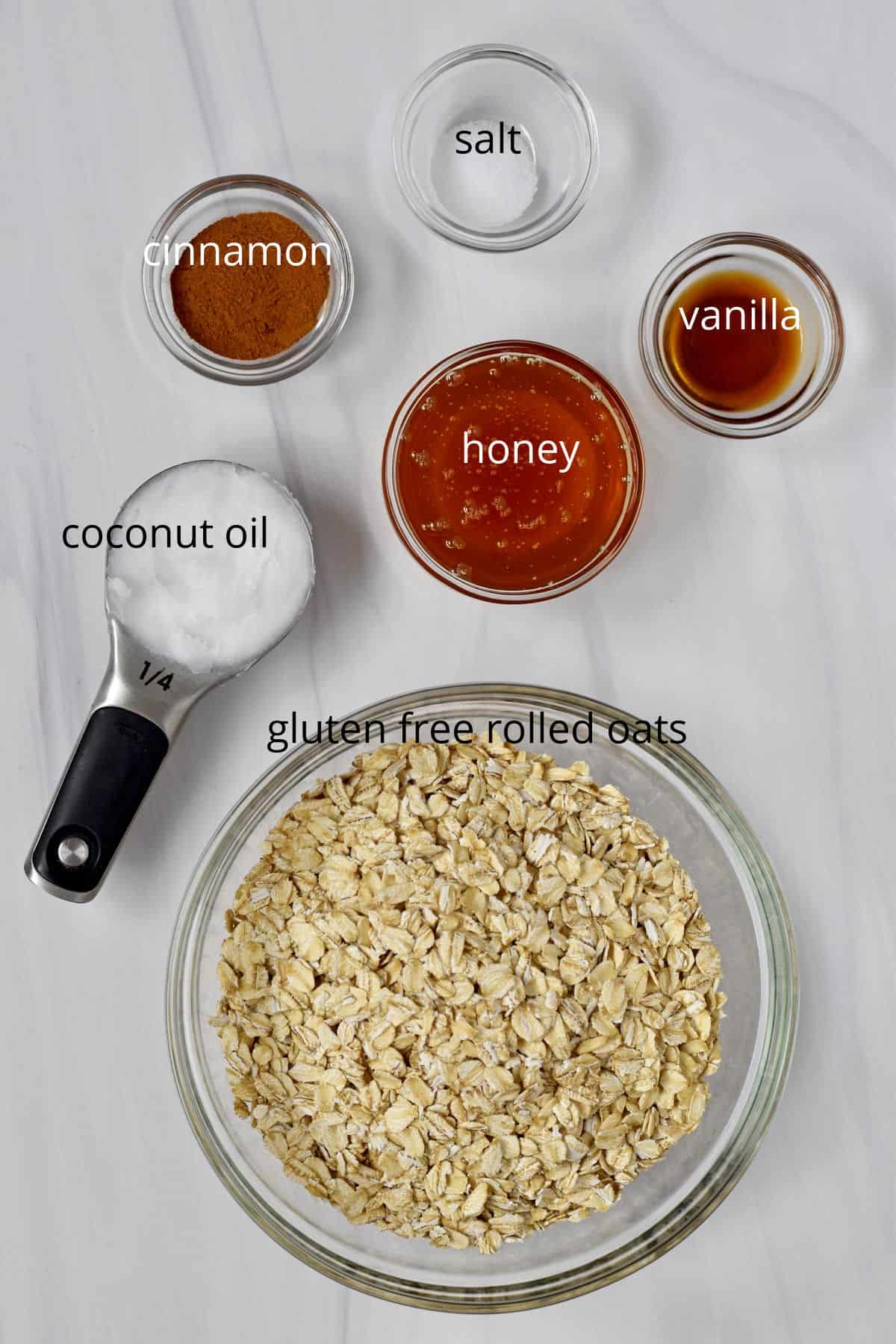 Cinnamon granola ingredients on kitchen countertop.