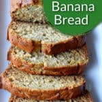 A sliced loaf of gluten free zucchini banana bread with text overlay, "Easy, GF Zucchini Banana Bread".