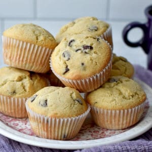 Close up of a plate of chocolate chip muffins.