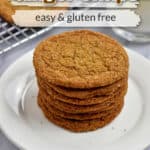 Stack of gluten free ginger snaps on a white plate with text overlay, "Ginger Snaps, Easy & Gluten Free."