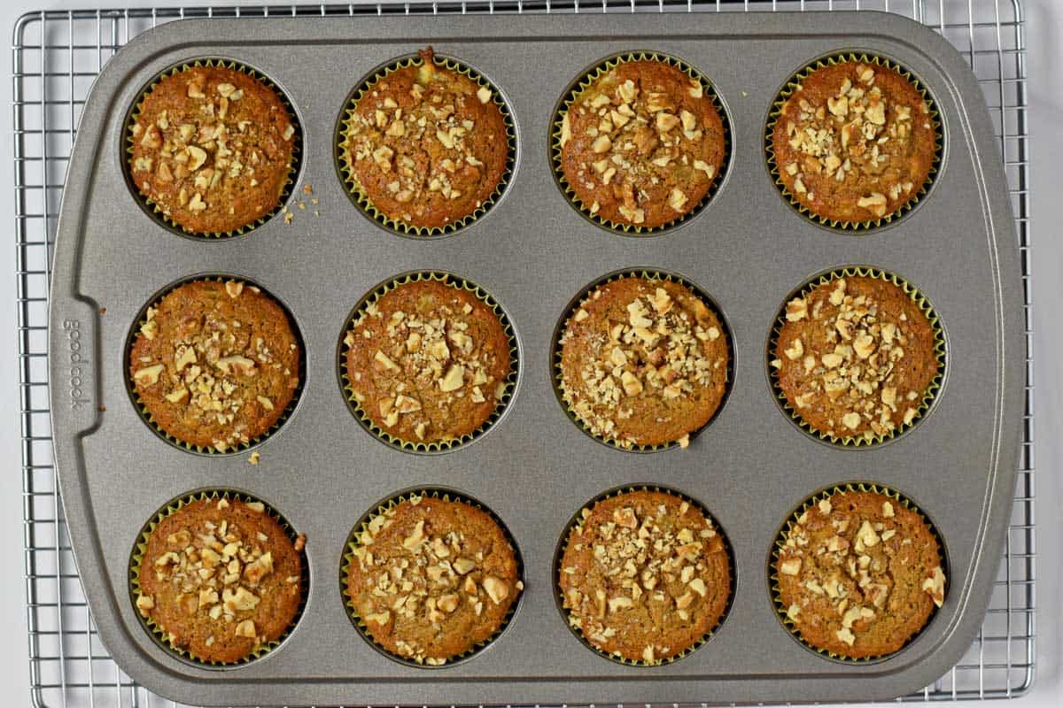 Overhead view of gluten free banana nut muffins in muffin tin.