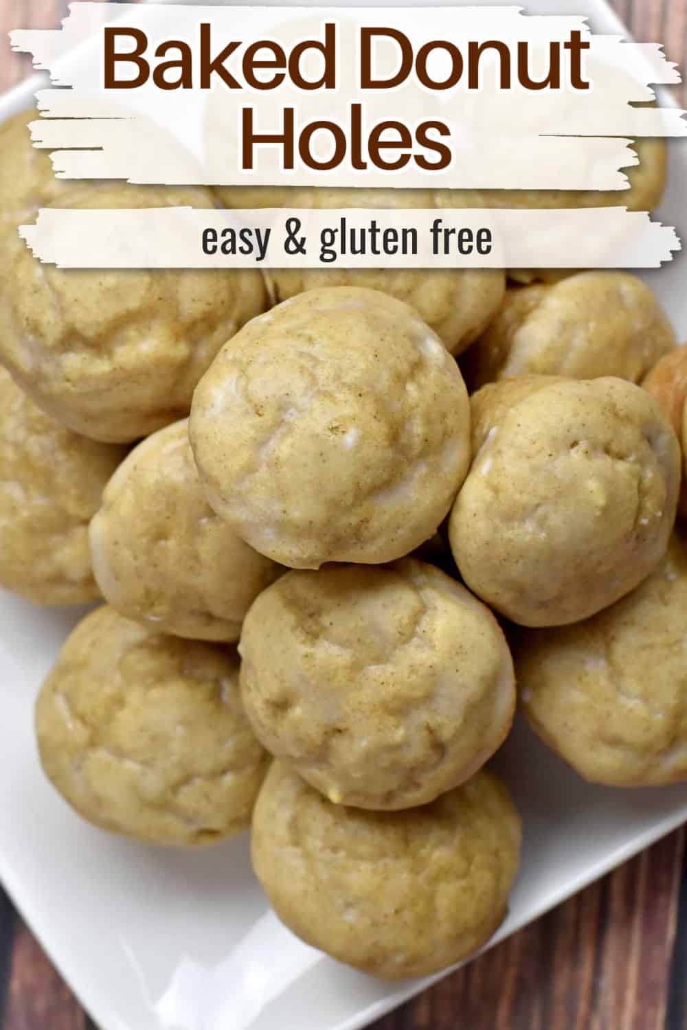 Baked gluten free donut holes on a white plate with text overlay, "Baked Donut Holes, Easy & Gluten Free."
