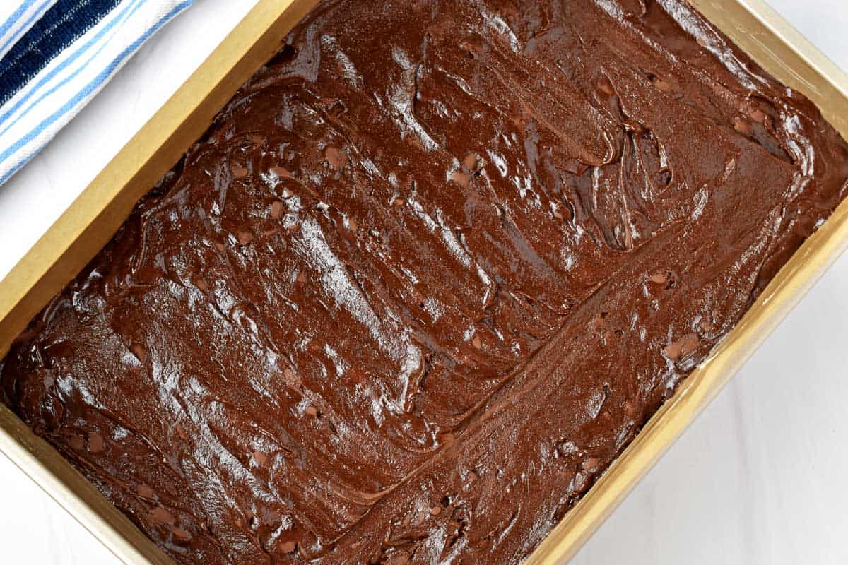 Brownie batter for cheesecake brownies in 9x13-inch pan.