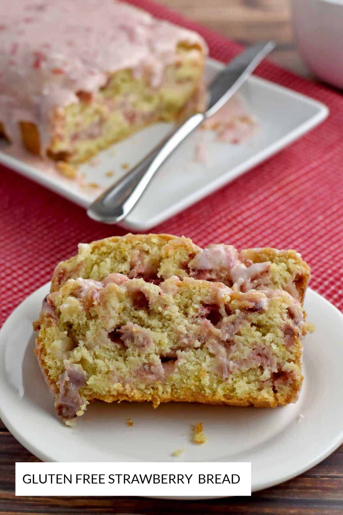 Two slices of gluten free strawberry bread on a round white dessert plate.